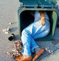 larry-wilder-asleep-in-trash-can.jpg